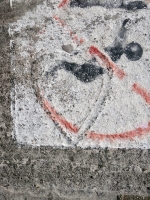 Wide-bordered heart. Chicago lakefront stone carvings, between Foster Avenue and Montrose. 2023