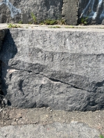 Frank ~ Kim, level 2, vertical. Chicago lakefront stone carvings, between Foster Avenue and Montrose. 2023