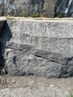 Frank ~ Kim, level 2, vertical. Chicago lakefront stone carvings, between Foster Avenue and Montrose. 2023 Frank ~ Kim, level 2, vertical. Chicago lakefront stone carvings, between Foster Avenue and Montrose. 2023