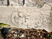 LF + LS, level 2. Chicago lakefront stone carvings, between Foster Avenue and Montrose. 2007