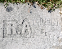 R. Allen and Betty. Chicago lakefront stone carvings, between Foster Avenue and Montrose. 2023