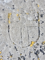 Cross in shield, detail. Chicago lakefront stone carvings, near Foster Avenue Beach. 2017