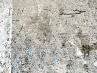 D.N. + L.V., with arrow. Chicago lakefront stone carvings, between Foster Avenue Beach and Montrose. 2023 D.N. + L.V., with arrow. Chicago lakefront stone carvings, between Foster Avenue Beach and Montrose. 2023