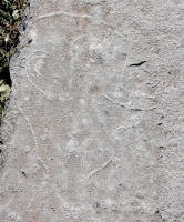 Long-nosed profile, faint. Chicago lakefront stone carvings, between Foster Beach and Montrose. 2017