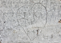 J.K. Love R.T. in heart with arrow 64, level 2. Chicago lakefront stone carvings, between Foster Avenue and Montrose. 2017