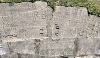 EP, 70, T.B., Steve + ??ee, R.B., J.J., AO, 70, RS, CIRO, T. + Z. O., R.A. Chicago lakefront stone carvings, between Foster Avenue and Montrose. 2023 EP, 70, T.B., Steve + ??ee, R.B., J.J., AO, 70, RS, CIRO, T. + Z. O., R.A. Chicago lakefront stone carvings, between Foster Avenue and Montrose. 2023