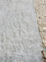 Peace symbol. Chicago lakefront stone carvings, between Foster Avenue and Bryn Mawr. 2018 Peace symbol. Chicago lakefront stone carvings, between Foster Avenue and Bryn Mawr. 2018