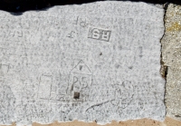 Building and garage, PS, RS, RF, JF, RH, heart with MG, JG and half an arrow. Chicago lakefront stone carvings, between Foster Avenue and Bryn Mawr. 2019 Building and garage, PS, RS, RF, JF, RH, heart with MG, JG and half an arrow. Chicago lakefront stone carvings, between Foster Avenue and Bryn Mawr. 2019