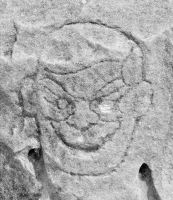 Pirate face. Chicago lakefront stone carvings, Foster Avenue Beach, 2017