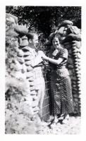 Couple posing in gate snapshot