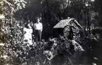 Couple at a water wheel snapshot