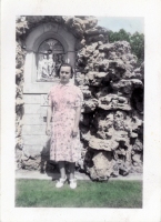 Woman posing with crucifixion shrine snapshot