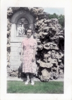 Woman posing with crucifixion shrine snapshot Woman posing with crucifixion shrine snapshot