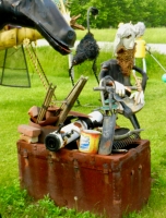 A sculpture? Pieces of unfinished sculpture? Sculpture plus junk pile? The prospector's kit? A sculpture? Pieces of unfinished sculpture? Sculpture plus junk pile? The prospector's kit?