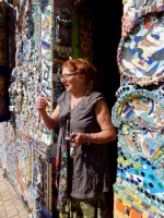 Danielle Jacqui in the door to her environment, the House of She Who Paints, Rocquevaire⁩, France