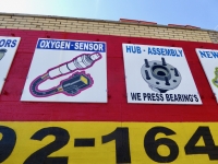 Signs at Julio's Auto Parts, Diversey at Sacramento (2016)-Roadside Art