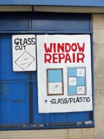 Window repair sign with window drawings Window repair sign with window drawings