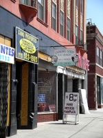 View of Looking Good Hair Design from down the block