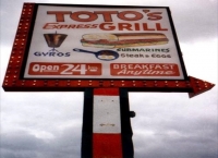 Toto's Express sign with gyros and sandwich Toto's Express sign with gyros and sandwich