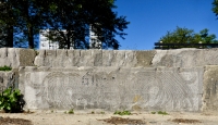 Wide panel with Mesoamerican imagery. Chicago lakefront stone carvings between Foster Avenue and Bryn Mawr. 2013