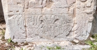 North outer pier, detail, Lower Temple of the Jaguar, Great Ballcourt. God N, as a Pawahtun, dressed in turtleshell armor. North outer pier, detail, Lower Temple of the Jaguar, Great Ballcourt. God N, as a Pawahtun, dressed in turtleshell armor.