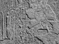Mesoamerican scene with reclining and stranding figures, detail. Chicago lakefront stone carvings between Foster Avenue and Bryn Mawr. 2013 Mesoamerican scene with reclining and stranding figures, detail. Chicago lakefront stone carvings between Foster Avenue and Bryn Mawr. 2013