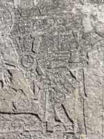 Mesoamerican scene with reclining and stranding figures, detail. Chicago lakefront stone carvings between Foster Avenue and Bryn Mawr. 2013 Mesoamerican scene with reclining and stranding figures, detail. Chicago lakefront stone carvings between Foster Avenue and Bryn Mawr. 2013