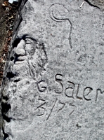 Rugged face and more. Chicago lakefront stone carvings, south of Montrose Harbor. 2003