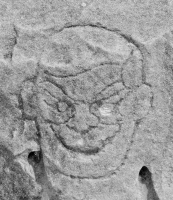 Pirate face. Chicago lakefront stone carvings, between Foster Avenue and Bryn Mawr. 2017 Pirate face. Chicago lakefront stone carvings, between Foster Avenue and Bryn Mawr. 2017