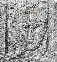Formerly gold-capped face. Chicago lakefront stone carvings, between Foster Avenue and Bryn Mawr. 2017 Formerly gold-capped face. Chicago lakefront stone carvings, between Foster Avenue and Bryn Mawr. 2017