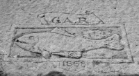 G.A.R. fish, 1958. Chicago lakefront stone carvings, between Foster Avenue and Bryn Mawr. Before 2003