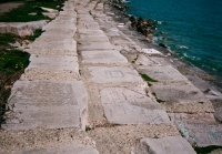 Once a great canvas: Chicago lakefront stone writings and paintings covering the stones between Belmont ahd Diversey Harbors. Before 2003