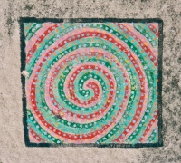 Spiral. Chicago lakefront stone paintings, between Belmont and Diversey Harbors. Before 2003