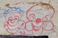 Red faces. Chicago lakefront stone drawings, near Montrose Beach. 2017 Red faces. Chicago lakefront stone drawings, near Montrose Beach. 2017