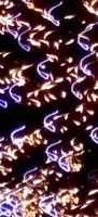 White shapes dissipating fireworks closeup