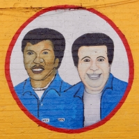 Portrait of two men. Frank's West Side Auto Parts, Kedzie at 30th Street. A junk yard art gallery