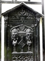 Two weird faces on part of decorated door, Plas Newydd, Llangollen, Wales