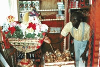 Rev. Dennis showing off the Ark of the Covenant at Margaret's Grocery, Vicksburg