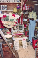 Rev. Dennis showing off the Ark of the Covenant at Margaret's Grocery, Vicksburg