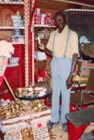 Rev. Dennis showing off the Ark of the Covenant at Margaret's Grocery, Vicksburg