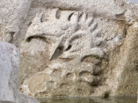 Elaborate carving of a creature. Chicago Lakefront stone carvings, south of La Rabida Hospital. 2024