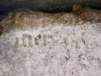 Melvin and undeciphered, detail. Chicago Lakefront stone carvings, south of La Rabida Hospital. 2024