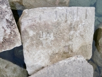 Jake, Jim, Focle, deep cut shapes. Chicago Lakefront stone carvings, south of La Rabida Hospital. 2024