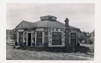 Decorated building near N.E. Galloway totem pole, Foyil, Oklahoma, postcard