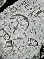 Flapper, with names. Lost. Chicago lakefront stone carvings, south of Montrose Harbor. 2003