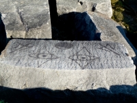 Watching the lake, with gang signs. Lost. Chicago lakefront stone drawings, south of Montrose Harbor. 2008