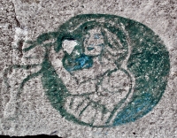 Starbucks logo. Lost. Chicago lakefront stone paintings, south of Montrose Harbor. 2003