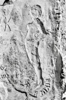 Standing bathing beauty. Aron Packer photo. Chicago lakefront stone carvings, Montrose Harbor.