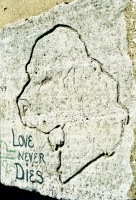 Dog portrait, Love Never Dies. Aron Packer photo. Chicago lakefront stone carvings, probably Montrose Harbor. 1988
