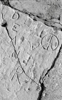 Peace symbol, Dean R, Pat. Aron Packer photo. Chicago lakefront stone carvings, Montrose Harbor.
